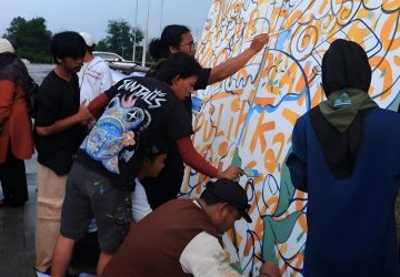 Aksi Mural Kolektif di Hari Bumi 2026, WALHI Riau Serukan Transisi Energi yang Berkeadilan